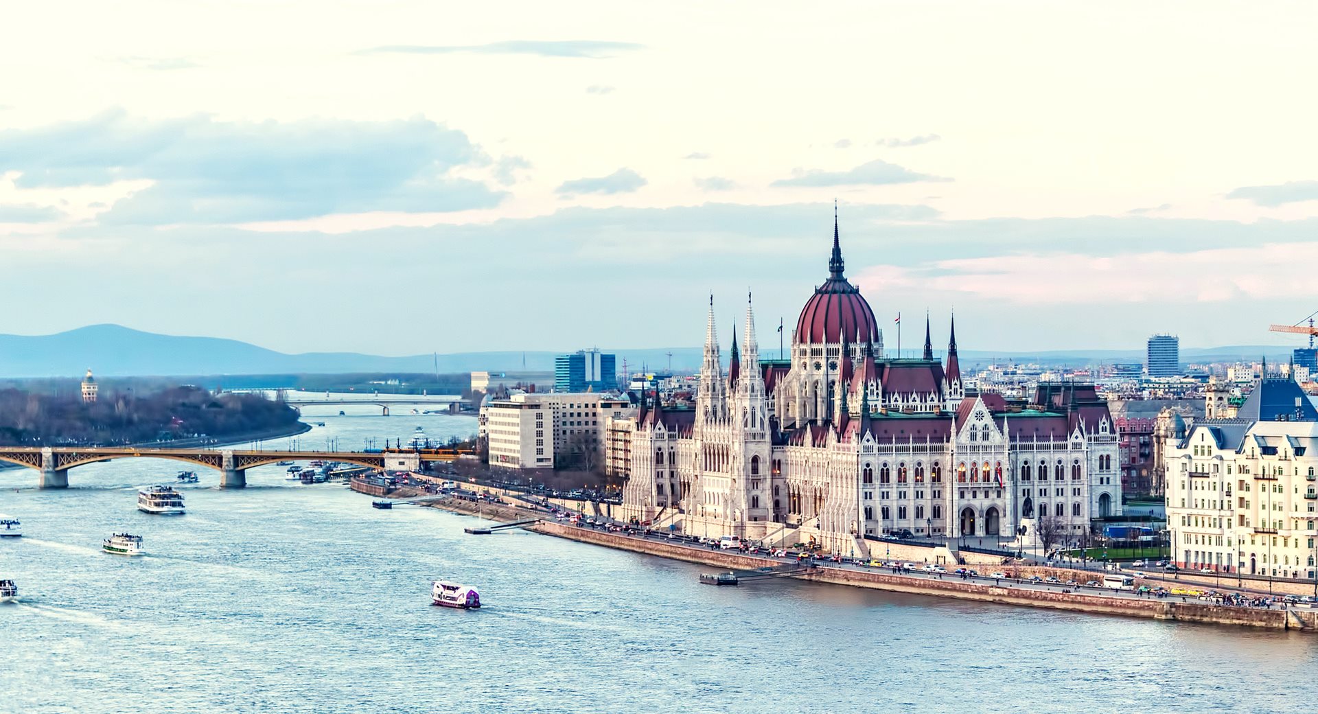 River cruise ships on the Danube at sunset — river cruise deals